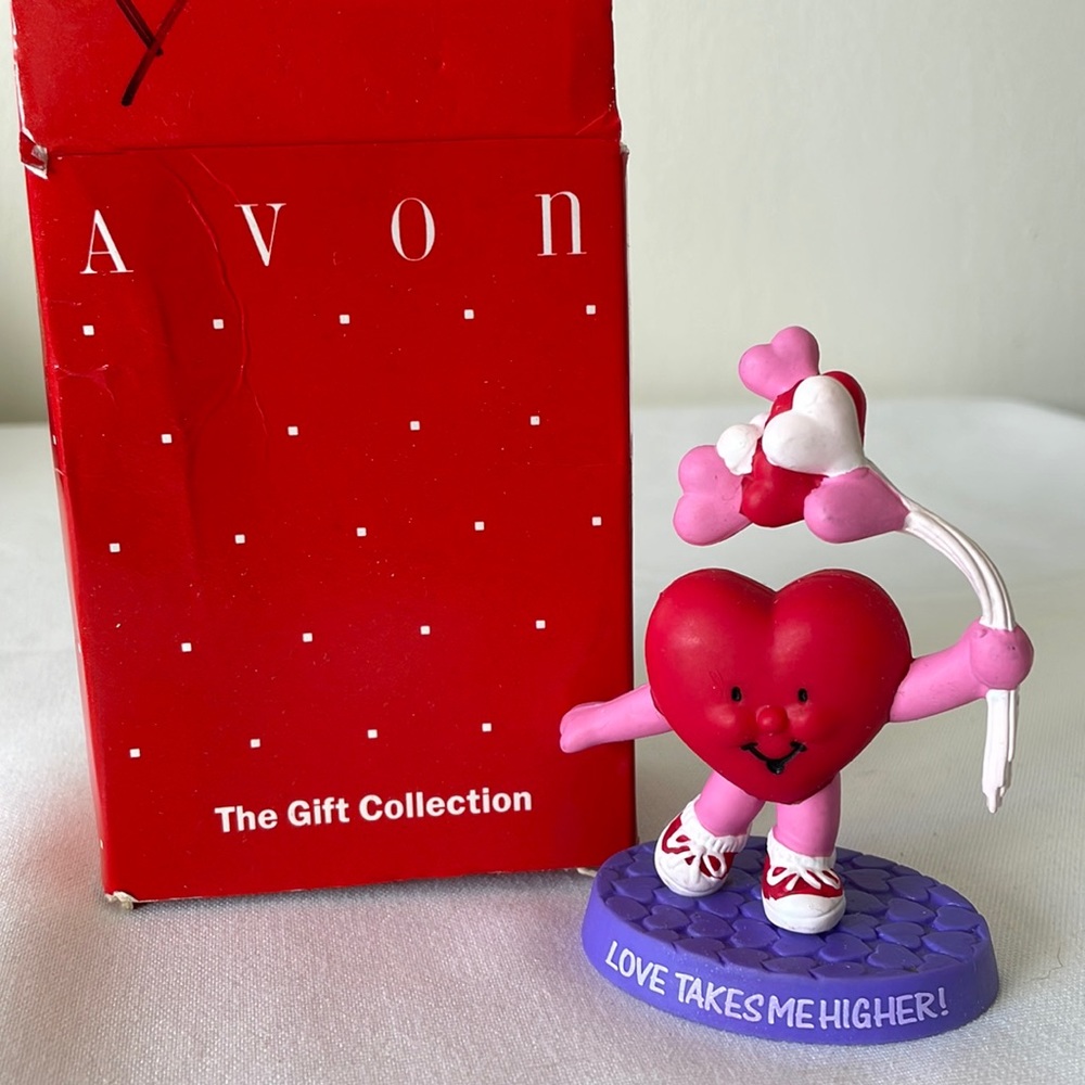 Avon love takes me higher figurine!!!